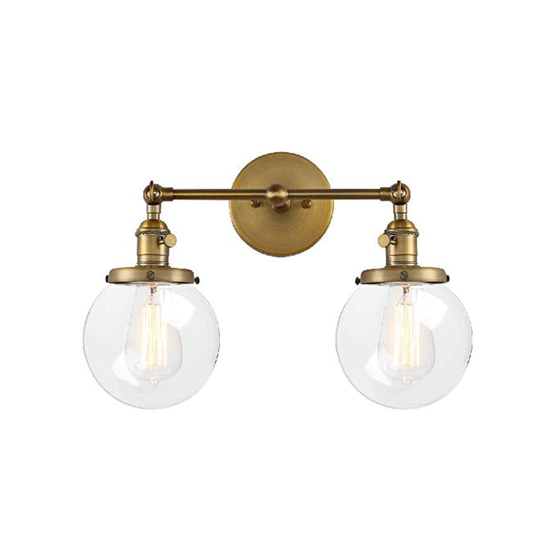 Round Living Room Wall Light Fixture Industrial Clear Glass 2-Light Black/Brass Sconce Lamp for Study Room Clearhalo 'Cast Iron' 'Glass' 'Industrial wall lights' 'Industrial' 'Middle century wall lights' 'Modern' 'Tiffany' 'Traditional wall lights' 'Wall Lamps & Sconces' 'Wall Lights' Lighting' 159817