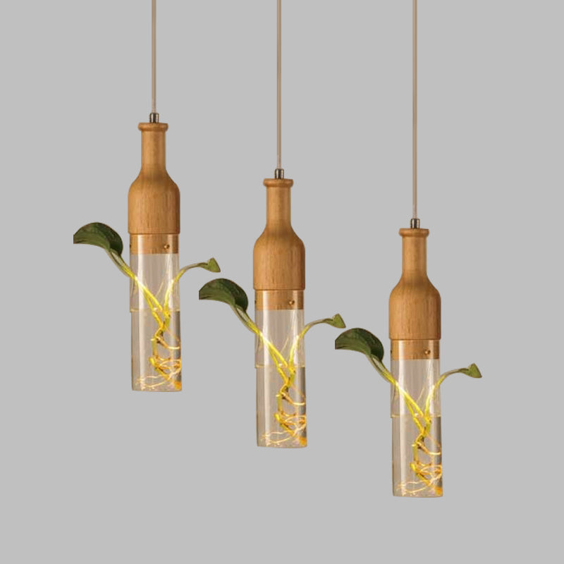 3 Bulbs Clear Glass Multi Light Pendant Industrial Wood Wine Bottle Restaurant Suspension Lighting Clearhalo 'Ceiling Lights' 'Glass shade' 'Glass' 'Industrial Pendants' 'Industrial' 'Middle Century Pendants' 'Pendant Lights' 'Pendants' 'Tiffany' Lighting' 1604296