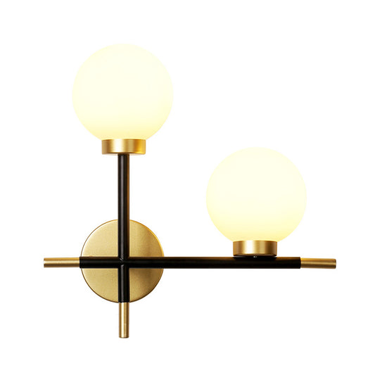 2-Bulb Milky Glass Sconce Light Fixture Modern Black Double Globe Living Room Wall Lamp with Cross Design Clearhalo 'Cast Iron' 'Glass' 'Industrial' 'Modern wall lights' 'Modern' 'Tiffany' 'Traditional wall lights' 'Wall Lamps & Sconces' 'Wall Lights' Lighting' 161517