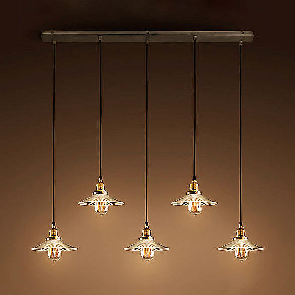 5-Light Cone Cluster Pendant Antique Style Aged Brass Ribbed Clear Glass Hanging Lighting with Linear Canopy Clear Clearhalo 'Ceiling Lights' 'Glass shade' 'Glass' 'Industrial Pendants' 'Industrial' 'Middle Century Pendants' 'Pendant Lights' 'Pendants' 'Tiffany' Lighting' 16262
