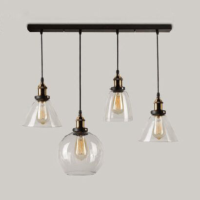 4-Light Multiple Hanging Light with Different Shade Clear Glass Modern Cluster Pendant in Aged Brass, Linear/Round Canopy Clear Linear Clearhalo 'Ceiling Lights' 'Glass shade' 'Glass' 'Industrial Pendants' 'Industrial' 'Middle Century Pendants' 'Pendant Lights' 'Pendants' 'Tiffany' Lighting' 16297