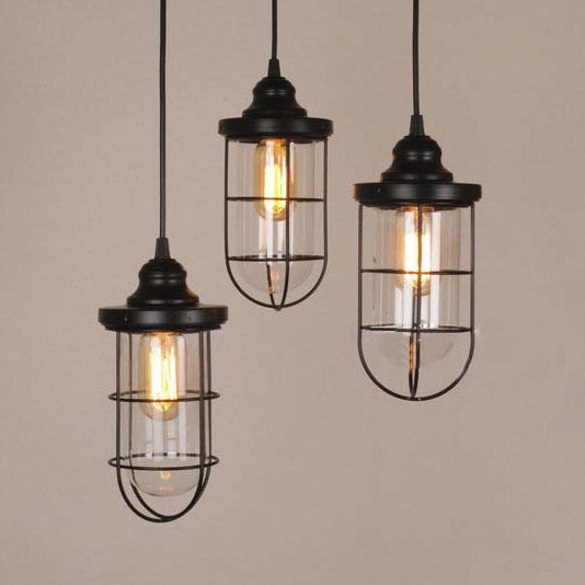 2/3 Bulbs Caged Multiple Lamp Pendant Industrial Black Clear Glass Hanging Light Kit, Linear/Round Canopy Clearhalo 'Ceiling Lights' 'Glass shade' 'Glass' 'Industrial Pendants' 'Industrial' 'Middle Century Pendants' 'Pendant Lights' 'Pendants' 'Tiffany' Lighting' 16315