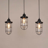 2/3 Bulbs Caged Multiple Lamp Pendant Industrial Black Clear Glass Hanging Light Kit, Linear/Round Canopy 3 Black Linear Clearhalo 'Ceiling Lights' 'Glass shade' 'Glass' 'Industrial Pendants' 'Industrial' 'Middle Century Pendants' 'Pendant Lights' 'Pendants' 'Tiffany' Lighting' 16318