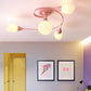 Curly Semi Flush Mount Light Nordic Iron 4/6-Head Grey/Pink/Yellow Ceiling Lamp with White Glass Shade 4 Pink Clearhalo 'Ceiling Lights' 'Chandeliers' 'Close To Ceiling Lights' 'Close to ceiling' 'Glass shade' 'Glass' 'Semi-flushmount' Lighting' 163314