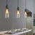 One Bulb Jug Style Pendant Lighting Fixture Industrial Black Clear Glass Hanging Ceiling Light Clear Clearhalo 'Ceiling Lights' 'Close To Ceiling Lights' 'Glass shade' 'Glass' 'Industrial Pendants' 'Industrial' 'Middle Century Pendants' 'Pendant Lights' 'Pendants' 'Tiffany' Lighting' 163740
