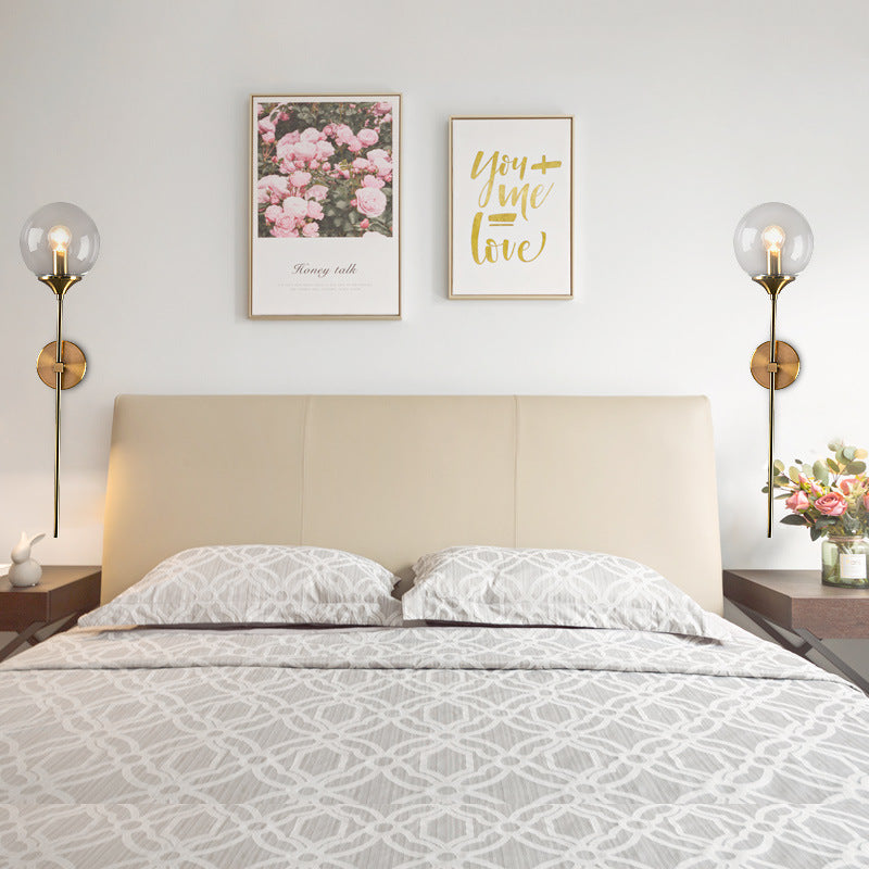 Modern Globe Shade Wall Lighting Single Bulb Clear/Grey/Amber Glass Sconce Light in Brass for Bedroom Clearhalo 'Art deco wall lights' 'Cast Iron' 'Glass' 'Industrial wall lights' 'Industrial' 'Middle century wall lights' 'Modern' 'Rustic wall lights' 'Tiffany' 'Traditional wall lights' 'Wall Lamps & Sconces' 'Wall Lights' Lighting' 163875