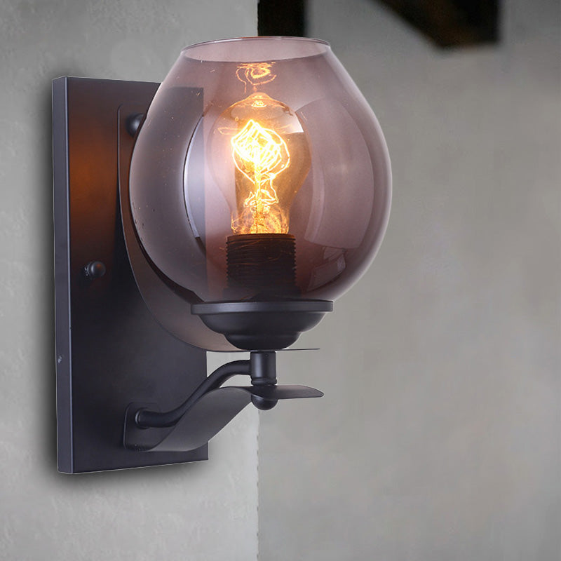 One Light Wall Sconce Lighting with Orb Shade Grey Glass Industrial Coffee Shop Light Fixture in Black Clearhalo 'Cast Iron' 'Glass' 'Industrial wall lights' 'Industrial' 'Middle century wall lights' 'Modern' 'Tiffany' 'Traditional wall lights' 'Wall Lamps & Sconces' 'Wall Lights' Lighting' 164194