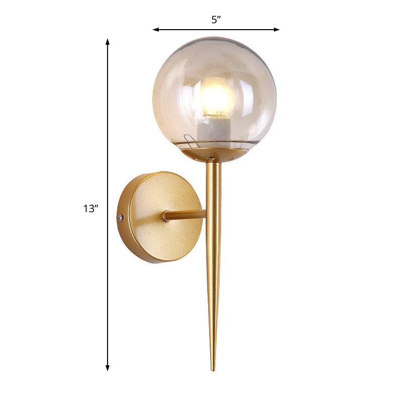 Clear Glass Globe Wall Sconce Modern 1 Light Living Room Lighting Fixture in Gold Clearhalo 'Cast Iron' 'Glass' 'Industrial wall lights' 'Industrial' 'Middle century wall lights' 'Modern' 'Tiffany' 'Traditional wall lights' 'Wall Lamps & Sconces' 'Wall Lights' Lighting' 164744