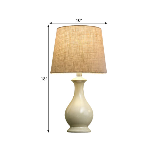 1 Bulb Conical Desk Lamp Countryside Beige Fabric Nightstand Light with White Vase Shape Base Clearhalo 'Lamps' 'Table Lamps' Lighting' 1649682