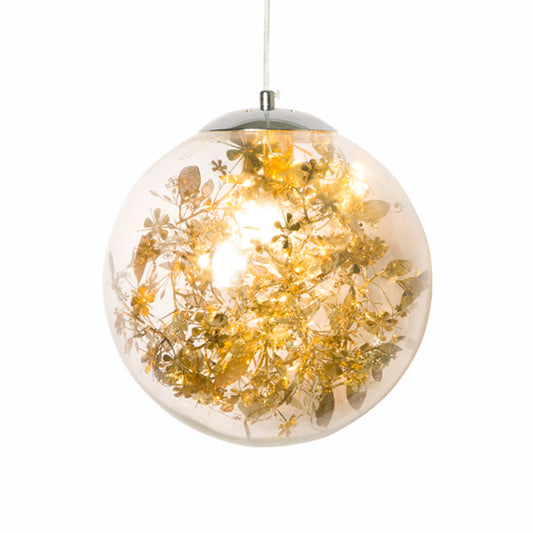 Globe Bedroom Hanging Light Clear Glass 1-Light Modernist Pendant Lighting with Inner Leaf Decor in Silver/Gold Clearhalo 'Ceiling Lights' 'Chandeliers' 'Glass shade' 'Glass' 'Pendant Lights' 'Pendants' Lighting' 1650037