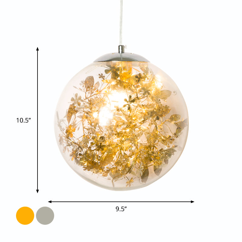 Globe Bedroom Hanging Light Clear Glass 1-Light Modernist Pendant Lighting with Inner Leaf Decor in Silver/Gold Clearhalo 'Ceiling Lights' 'Chandeliers' 'Glass shade' 'Glass' 'Pendant Lights' 'Pendants' Lighting' 1650038
