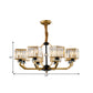 Crystal Prisms Cube Ceiling Chandelier Minimalist 3/6/8-Bulb Hanging Pendant Light with Curved Arm in Brass Clearhalo 'Ceiling Lights' 'Chandeliers' 'Close To Ceiling Lights' 'Glass shade' 'Glass' 'Modern Chandeliers' 'Modern' 'Pendant Lights' Lighting' 1650692