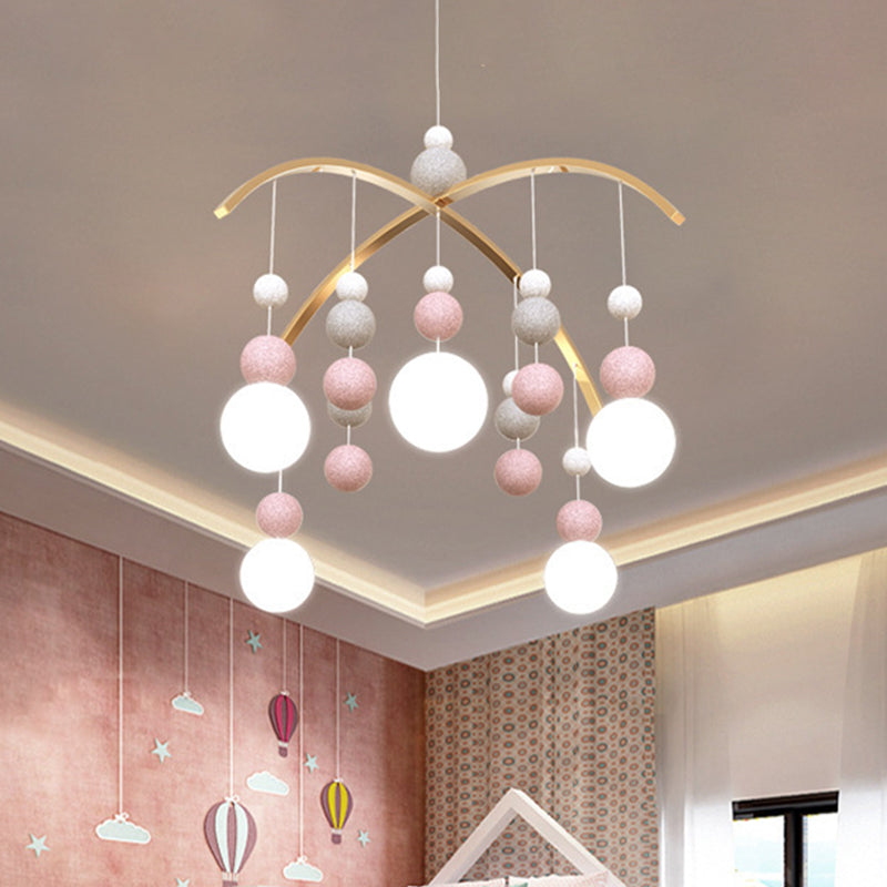 Globe Chandelier Light Cartoon White Glass 5-Bulb Pink/Blue Hanging Pendant with Small Ball Decor Pink Clearhalo 'Ceiling Lights' 'Chandeliers' Lighting' options 1651097_872dfc9e-be91-4339-bbe7-af356bf4d624