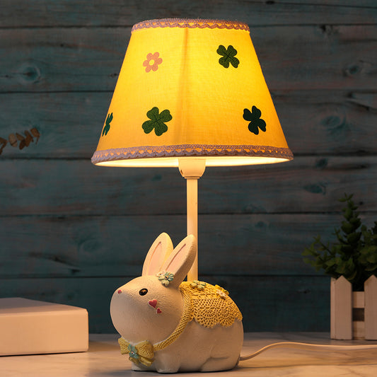 Conical Fabric Study Lamp Cartoon 1-Light Yellow Table Light with Clover Pattern and Rabbit Base Yellow Clearhalo 'Lamps' 'Table Lamps' Lighting' 1651333