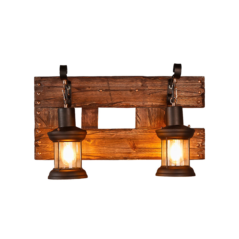 Clear Glass Black Wall Sconce Lighting Lantern 2-Light Industrial Light Fixture with Wooden Backplate Clearhalo 'Industrial wall lights' 'Industrial' 'Middle century wall lights' 'Rustic wall lights' 'Tiffany' 'Wall Lamps & Sconces' 'Wall Lights' Lighting' 165281