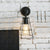 Vintage Style Conic Cage Wall Mount Light with Curved Arm 1 Light Metallic Wall Lamp in Black/White Black Clearhalo 'Art deco wall lights' 'Cast Iron' 'Glass' 'Industrial wall lights' 'Industrial' 'Middle century wall lights' 'Modern' 'Rustic wall lights' 'Tiffany' 'Traditional wall lights' 'Wall Lamps & Sconces' 'Wall Lights' Lighting' 165903