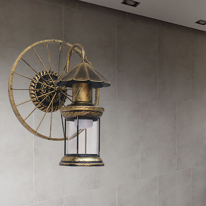 Black/Bronze Lantern Wall Sconce Light Vintage Industrial Metal 1 Light Restaurant Sconce Lamp with Wheel Decoration Bronze Clearhalo 'Art deco wall lights' 'Cast Iron' 'Glass' 'Industrial wall lights' 'Industrial' 'Middle century wall lights' 'Modern' 'Rustic wall lights' 'Tiffany' 'Traditional wall lights' 'Wall Lamps & Sconces' 'Wall Lights' Lighting' 168306