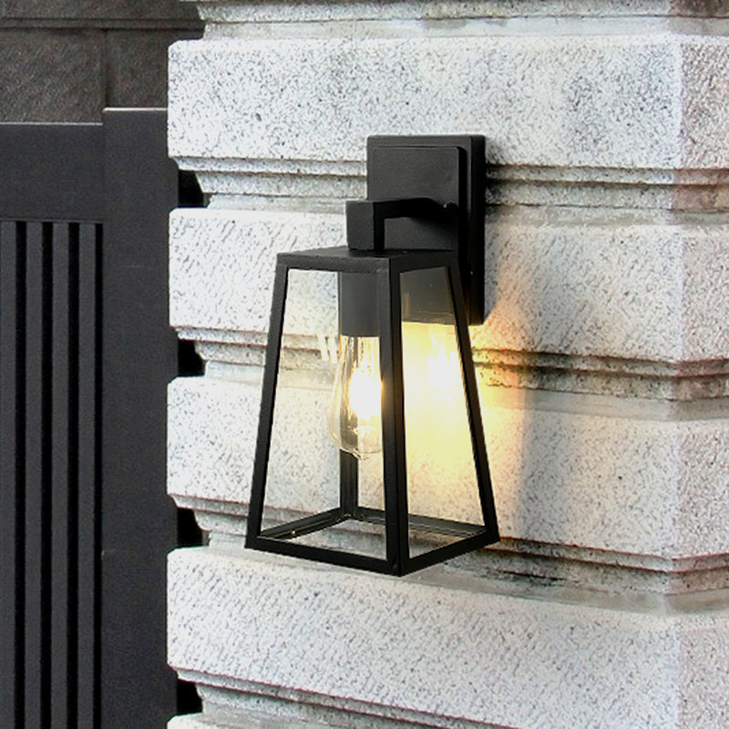 1 Light Wall Lamp Fixture Rustic Style Trapezoid Clear Glass Wall Mount Lighting in Black Black Clearhalo 'Art deco wall lights' 'Cast Iron' 'Glass' 'Industrial wall lights' 'Industrial' 'Middle century wall lights' 'Modern' 'Rustic wall lights' 'Tiffany' 'Traditional wall lights' 'Wall Lamps & Sconces' 'Wall Lights' Lighting' 1687788