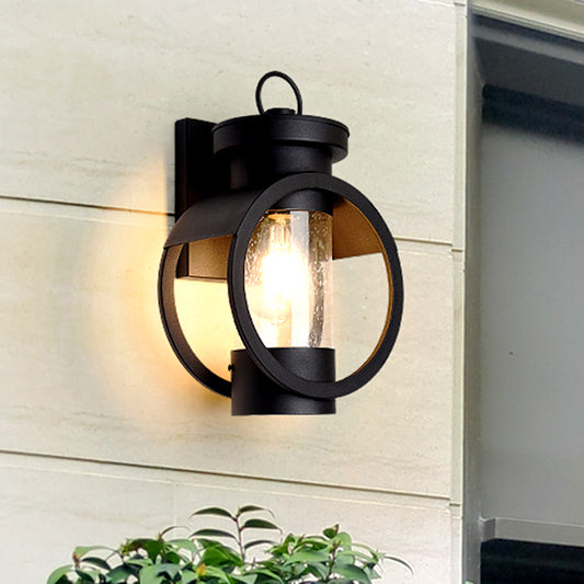 Cylindrical Courtyard Wall Sconce Traditional Seedy Glass 1-Bulb Black Wall Mount Lamp Black Clearhalo 'Art deco wall lights' 'Cast Iron' 'Glass' 'Industrial wall lights' 'Industrial' 'Middle century wall lights' 'Modern' 'Rustic wall lights' 'Tiffany' 'Traditional wall lights' 'Wall Lamps & Sconces' 'Wall Lights' Lighting' 1687796