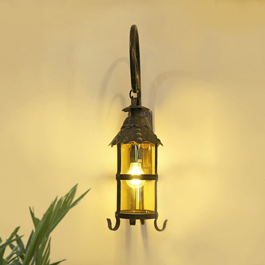 Retro Lantern Wall Mount Lighting 1 Head Metallic Wall Light Fixture with Scroll Arm in Antique Bronze Clearhalo 'Art deco wall lights' 'Cast Iron' 'Glass' 'Industrial wall lights' 'Industrial' 'Middle century wall lights' 'Modern' 'Rustic wall lights' 'Tiffany' 'Traditional wall lights' 'Wall Lamps & Sconces' 'Wall Lights' Lighting' 1687979