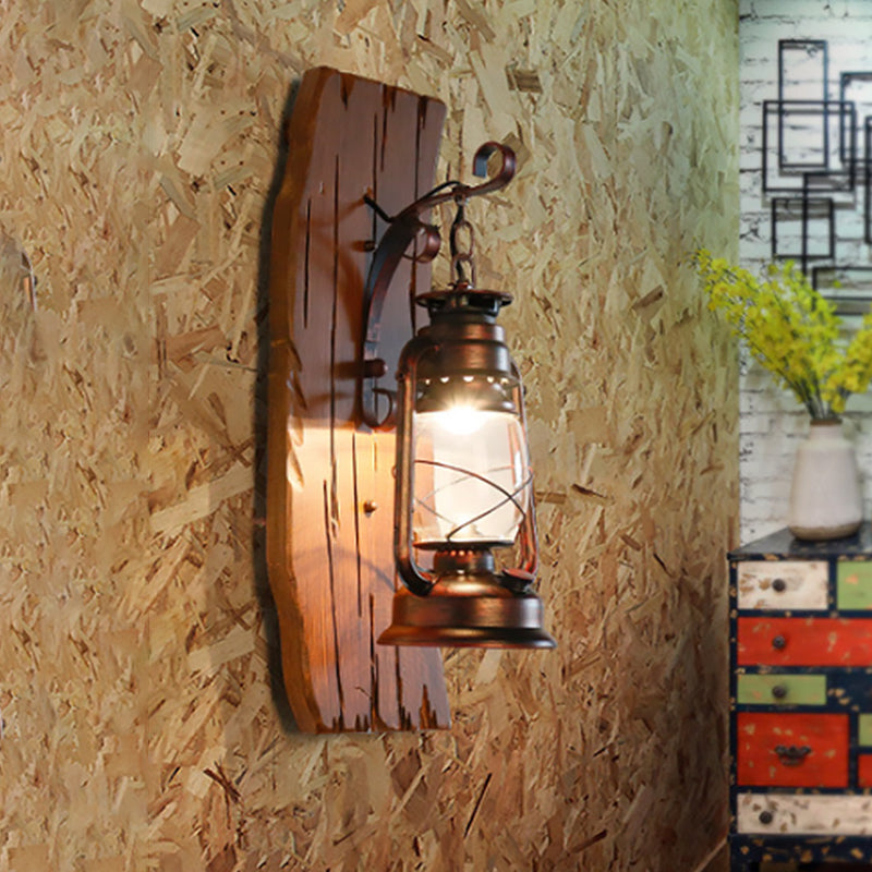 Brown Kerosene Lamp Wall Sconce Antique Clear Glass 1-Head Lodge Wall Light with Wood Backplate Clearhalo 'Industrial wall lights' 'Industrial' 'Middle century wall lights' 'Rustic wall lights' 'Tiffany' 'Wall Lamps & Sconces' 'Wall Lights' Lighting' 1688700