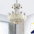 Crystal Ball Tapered Chandelier Lighting Simplicity 8-Bulb White Pendant Light Kit with Scrolled Frame Clear Clearhalo 'Ceiling Lights' 'Chandeliers' 'Clear' 'Industrial' 'Modern Chandeliers' 'Modern' 'Tiffany' 'Traditional Chandeliers' Lighting' 1694174