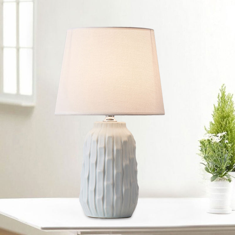Modernist Conical Table Light Fabric 1 Head Bedroom Desk Lamp with Cylinder Ceramic Base in White/Pink/Blue Blue Clearhalo 'Lamps' 'Table Lamps' Lighting' 1694461