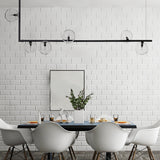 Clear Glass Globe Island Pendant Modernist 6 Bulbs Hanging Lamp Kit in Black with Right Angled Frame, Warm/White Light Clearhalo 'Ceiling Lights' 'Chandeliers' 'Glass shade' 'Glass' 'Island Lights' Lighting' 1710332