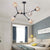 Black Branch Chandelier Modern Nordic Style 6/8/9 Lights Amber/Blue/Clear Glass Ceiling Light with Adjustable Arm 6 Amber Clearhalo 'Ceiling Lights' 'Chandeliers' 'Clear' 'Glass shade' 'Glass' 'Industrial' 'Modern Chandeliers' 'Modern' 'Tiffany' 'Traditional Chandeliers' Lighting' 171391