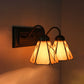 Cone Beige Glass Sconce Light Tiffany 2 Heads Black Wall Mounted Light for Living Room Clearhalo 'Industrial' 'Middle century wall lights' 'Tiffany wall lights' 'Tiffany' 'Wall Lamps & Sconces' 'Wall Lights' Lighting' 174836