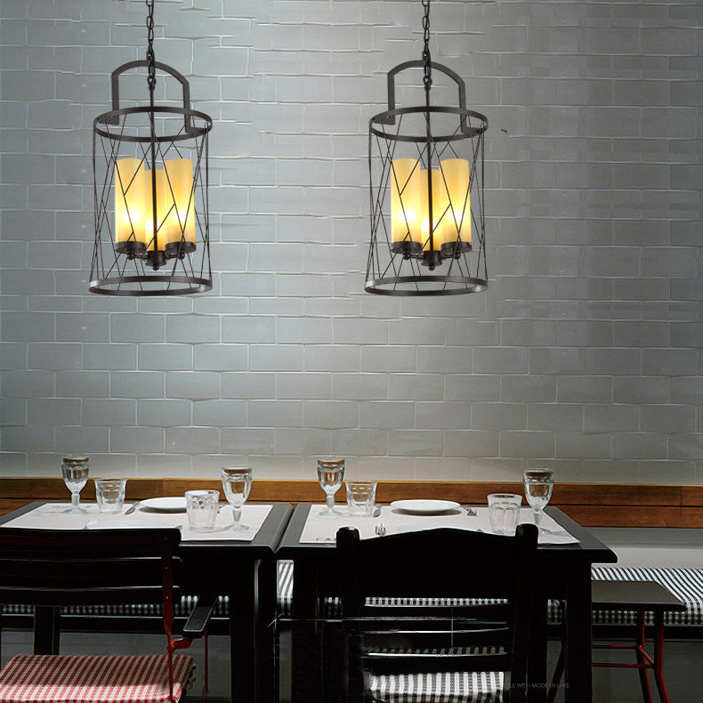 Cylinder Glass Shade Hanging Light with Wire Frame Industrial 3 Heads Restaurant Pendant Lamp in Black Clearhalo 'Cast Iron' 'Ceiling Lights' 'Chandeliers' 'Industrial Chandeliers' 'Industrial' 'Metal' 'Middle Century Chandeliers' 'Rustic Chandeliers' 'Tiffany' Lighting' 175614