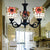 Sunflower Ceiling Chandelier Lodge Rustic 3 Lights Stained Glass Pendant Lighting in Black Finish Orange Clearhalo 'Ceiling Lights' 'Chandeliers' 'Industrial' 'Middle Century Chandeliers' 'Tiffany Chandeliers' 'Tiffany close to ceiling' 'Tiffany' Lighting' 175649
