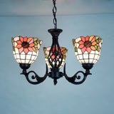 Sunflower Ceiling Chandelier Lodge Rustic 3 Lights Stained Glass Pendant Lighting in Black Finish Clearhalo 'Ceiling Lights' 'Chandeliers' 'Industrial' 'Middle Century Chandeliers' 'Tiffany Chandeliers' 'Tiffany close to ceiling' 'Tiffany' Lighting' 175650