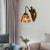 1 Head Wall Mount Light Tiffany Bell Multicolor Stained Glass Sconce Light Fixture in Antique Brass Antique Brass Clearhalo 'Industrial' 'Middle century wall lights' 'Tiffany wall lights' 'Tiffany' 'Wall Lamps & Sconces' 'Wall Lights' Lighting' 176145