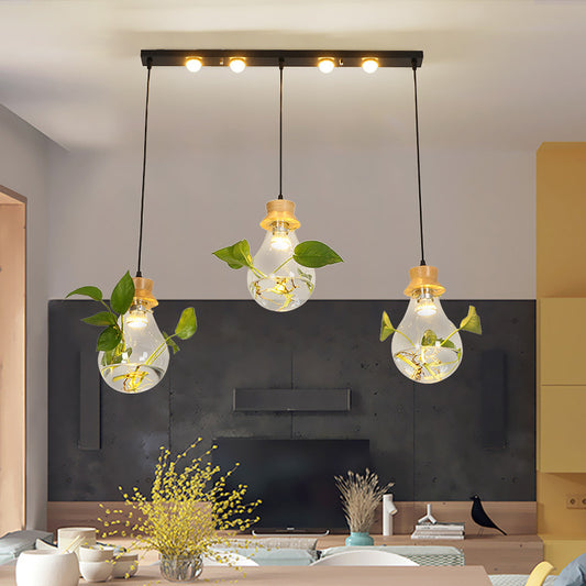12"/19.5" W 3-Head Cluster Pendant Farmhouse Bulb Shaped Clear Glass Hanging Light Kit in Black, Linear/Round Canopy Black 19.5" Clearhalo 'Ceiling Lights' 'Glass shade' 'Glass' 'Pendant Lights' 'Pendants' Lighting' 1781290