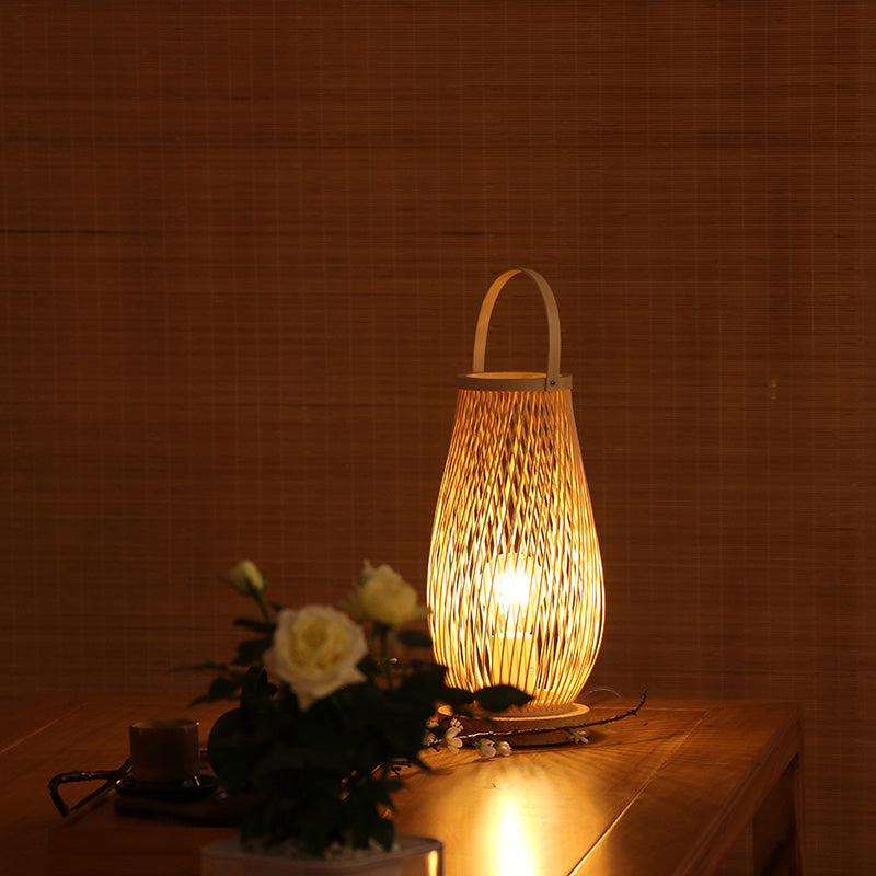 Single Bulb Bedroom Table Lamp Asian Style Beige Curved Handle Desk Lighting with Basket Bamboo Shade Clearhalo 'Lamps' 'Table Lamps' Lighting' 1787696