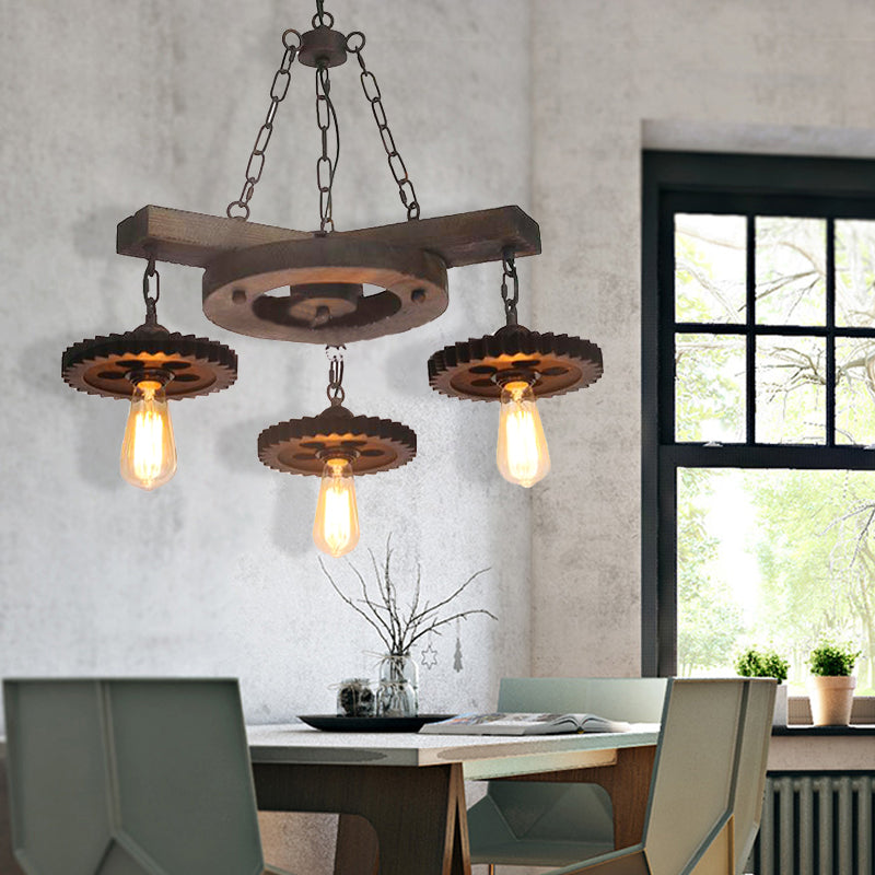 Metal Black Ceiling Chandelier Gear 3/7 Lights Industrial Down Lighting in Black with Round Wood Shelf 3 Black Clearhalo 'Cast Iron' 'Ceiling Lights' 'Chandeliers' 'Industrial Chandeliers' 'Industrial' 'Metal' 'Middle Century Chandeliers' 'Rustic Chandeliers' 'Tiffany' Lighting' 1787964