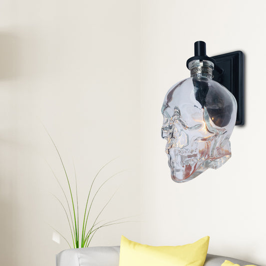 Black Skull Shape Sconce Lighting Vintage Clear Glass 1 Light Living Room Wall Mounted Lamp Fixture Black Clearhalo 'Cast Iron' 'Glass' 'Industrial wall lights' 'Industrial' 'Middle century wall lights' 'Modern' 'Tiffany' 'Traditional wall lights' 'Wall Lamps & Sconces' 'Wall Lights' Lighting' 1788211