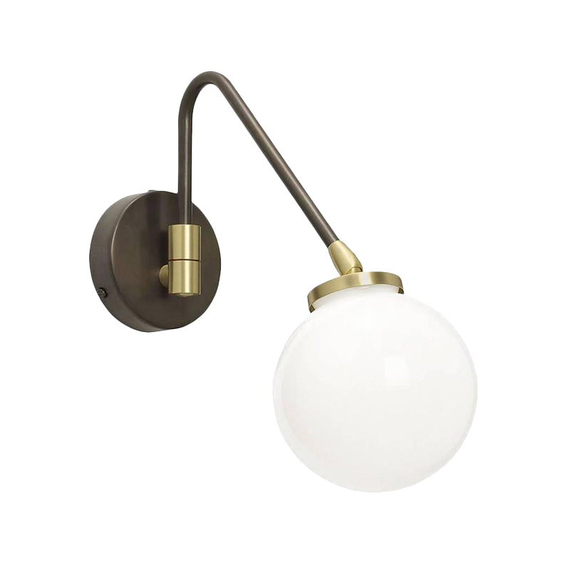 Minimalism Orb White Glass Wall Light 1 Head Sconce Light Fixture with Black-Gold Angled Arm Clearhalo 'Cast Iron' 'Glass' 'Industrial' 'Modern wall lights' 'Modern' 'Tiffany' 'Traditional wall lights' 'Wall Lamps & Sconces' 'Wall Lights' Lighting' 1788545