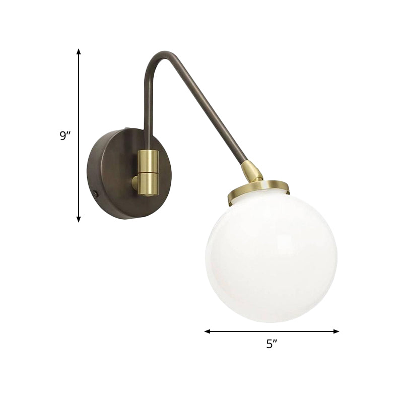 Minimalism Orb White Glass Wall Light 1 Head Sconce Light Fixture with Black-Gold Angled Arm Clearhalo 'Cast Iron' 'Glass' 'Industrial' 'Modern wall lights' 'Modern' 'Tiffany' 'Traditional wall lights' 'Wall Lamps & Sconces' 'Wall Lights' Lighting' 1788547
