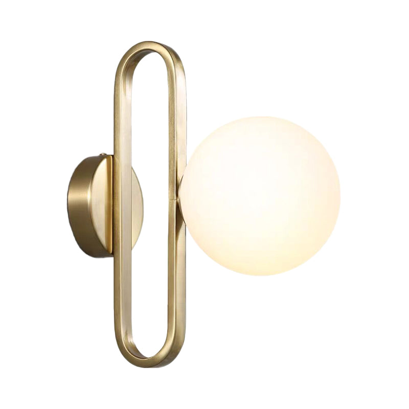 Cream Matte Glass Orb Wall Light Minimalist 1 Bulb Sconce Lighting with Gold Oval Arm Clearhalo 'Cast Iron' 'Glass' 'Industrial' 'Modern wall lights' 'Modern' 'Tiffany' 'Traditional wall lights' 'Wall Lamps & Sconces' 'Wall Lights' Lighting' 1788570