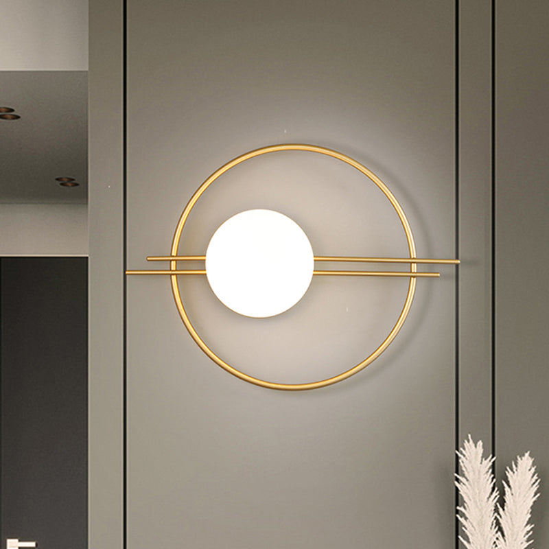 Circle Lounge Sconce Light Iron 1 Head Postmodern Wall Mounted Lighting in Black/Brass with Ball White Glass Shade Clearhalo 'Cast Iron' 'Glass' 'Industrial' 'Modern wall lights' 'Modern' 'Tiffany' 'Traditional wall lights' 'Wall Lamps & Sconces' 'Wall Lights' Lighting' 1788573