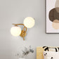 Gold Winding Wall Light Modern 2 Heads Metal Sconce Lighting Fixture with Orb Milk Glass Lampshade Clearhalo 'Cast Iron' 'Glass' 'Industrial' 'Modern wall lights' 'Modern' 'Tiffany' 'Traditional wall lights' 'Wall Lamps & Sconces' 'Wall Lights' Lighting' 1788581