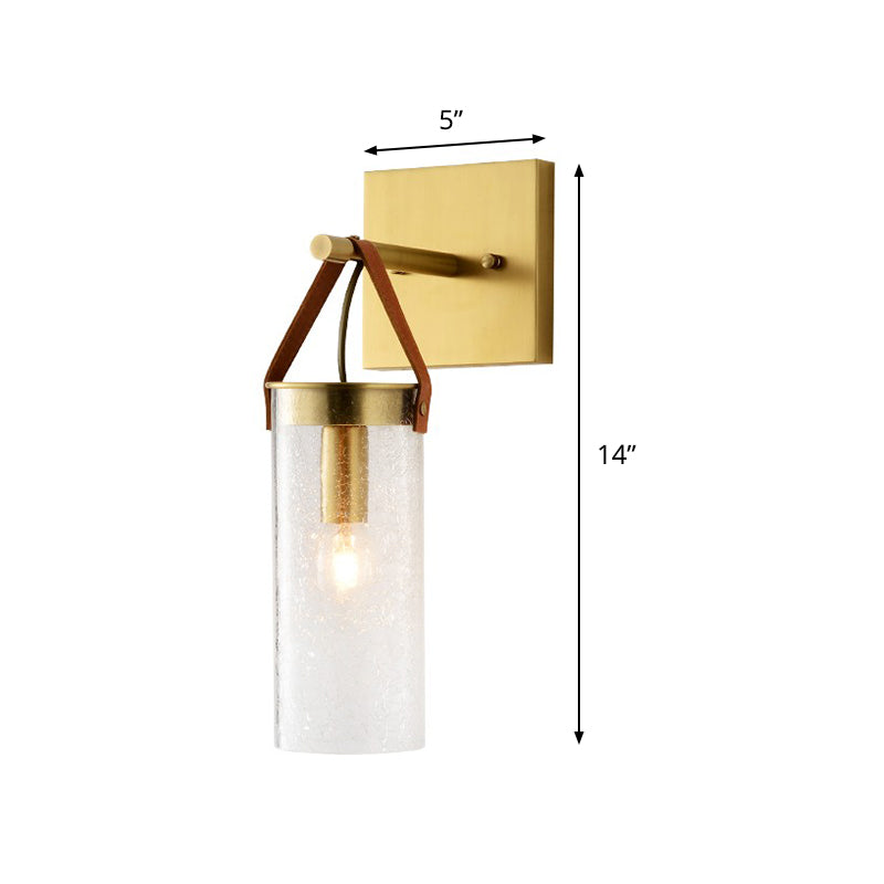 Postmodern Cylindrical Sconce Ideas Clear Crack Glass 1 Head Dining Room Wall Mounted Lamp in Brass with Leather Strap Clearhalo 'Cast Iron' 'Glass' 'Industrial' 'Modern wall lights' 'Modern' 'Tiffany' 'Traditional wall lights' 'Wall Lamps & Sconces' 'Wall Lights' Lighting' 1788613