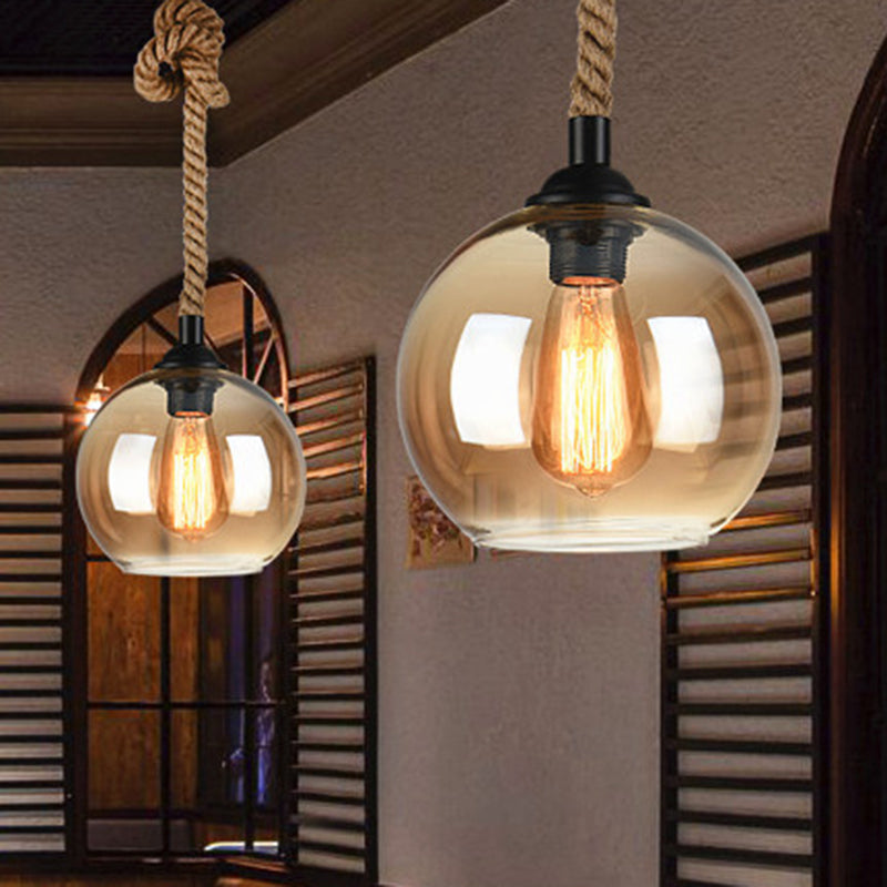 Amber/Clear Glass Ball Hanging Lighting Industrial 1 Head Restaurant Ceiling Pendant Lamp with Rope Rod Amber 10" Clearhalo 'Ceiling Lights' 'Glass shade' 'Glass' 'Industrial Pendants' 'Industrial' 'Middle Century Pendants' 'Pendant Lights' 'Pendants' 'Tiffany' Lighting' 1788614