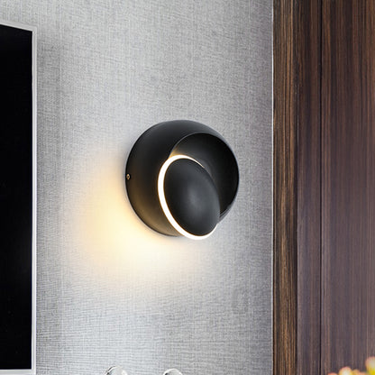 Black/White Rotating Ellipse Wall Lamp Modern Novelty Iron LED Surface Wall Sconce with Simulated Eclipse Design Black Clearhalo 'Cast Iron' 'Glass' 'Industrial' 'Modern wall lights' 'Modern' 'Tiffany' 'Traditional wall lights' 'Wall Lamps & Sconces' 'Wall Lights' Lighting' 1788983