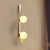 Brass Linear Wall Light Fixture Vintage 2 Heads Metallic Sconce Lamp with Orb Ivory Glass Shade Brass Clearhalo 'Cast Iron' 'Glass' 'Industrial' 'Modern wall lights' 'Modern' 'Tiffany' 'Traditional wall lights' 'Wall Lamps & Sconces' 'Wall Lights' Lighting' 1789095
