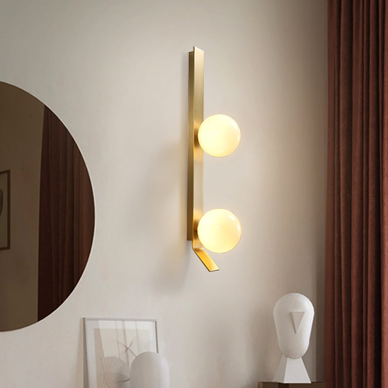 Brass Linear Wall Light Fixture Vintage 2 Heads Metallic Sconce Lamp with Orb Ivory Glass Shade Clearhalo 'Cast Iron' 'Glass' 'Industrial' 'Modern wall lights' 'Modern' 'Tiffany' 'Traditional wall lights' 'Wall Lamps & Sconces' 'Wall Lights' Lighting' 1789096