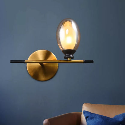 Brass Straight Rod Wall Lamp Mid Century 1 Head Metal Sconce Ideas with Dual Oval Clear/Amber Glass Shade Amber Clearhalo 'Cast Iron' 'Glass' 'Industrial' 'Modern wall lights' 'Modern' 'Tiffany' 'Traditional wall lights' 'Wall Lamps & Sconces' 'Wall Lights' Lighting' 1789119