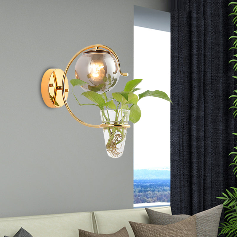 Cream/Smoke Gray Glass Orb Sconce Vintage 1-Bulb Bedroom Wall Lamp in Black/Gold with C-Shaped Arm and Plant Cup Gold Smoke Grey Clearhalo 'Art deco wall lights' 'Cast Iron' 'Glass' 'Industrial wall lights' 'Industrial' 'Middle century wall lights' 'Modern' 'Rustic wall lights' 'Tiffany' 'Traditional wall lights' 'Wall Lamps & Sconces' 'Wall Lights' Lighting' 1789305
